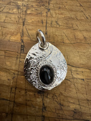 First Arrow’s Hammered Arabesque Carving Metal Pendant with Blackstar – P-012