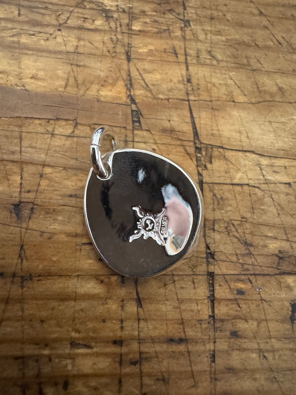 First Arrow’s Hammered Arabesque Carving Metal Pendant with Blackstar – P-012