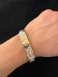First Arrow's 12mm Arabesque-Engraved Bangle with K18 Lightning Motif – (BR-378)