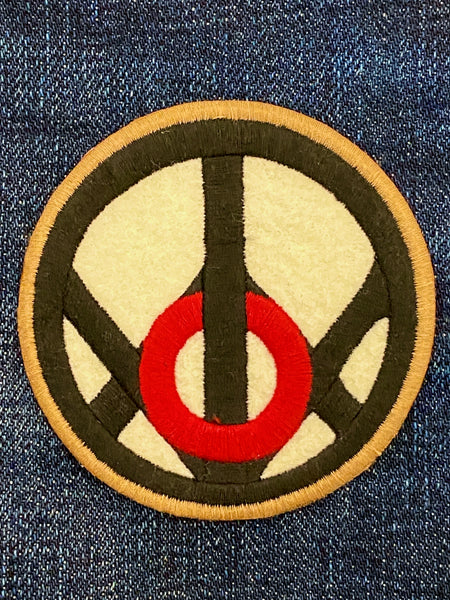Indigofera Forest Peace badge